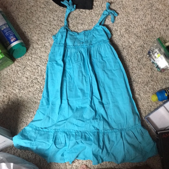 a light turquoise dress with ruffles - Picture 1 of 2